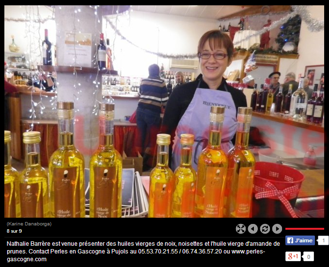 Photo in 'Sud Ouest' on Nathalie Barrère during the tasting of crepes with Perles de Gascogne Oils at the Brulhoix Christmas